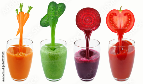 vegetable juices in a dripping glass isolated on white © slawek_zelasko