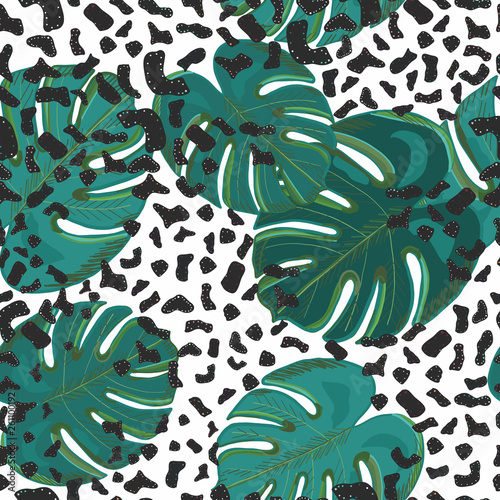 Seamless pattern for textile design. Colorful leopard pattern with hand drawn monstera leaves . Tropical vector seamless floral pattern background. Decorative beautiful illustration wallpaper © Gulsen Gunel