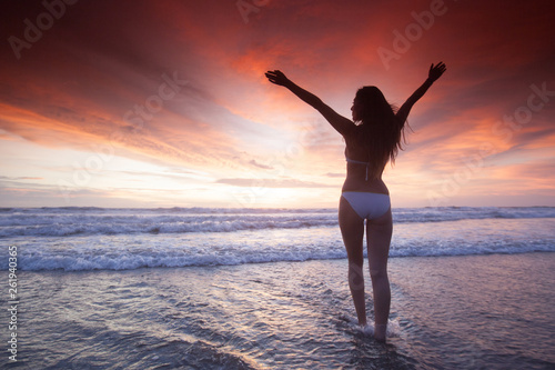 Woman at sea sunset © yellowj
