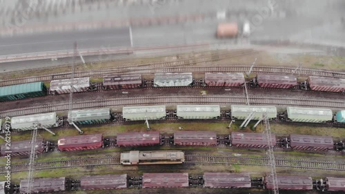 Freight and passenger train waiting at the train station parking lot.Cargo transit.import export and business logistic.Aerial view.Top view.Railway construction © shcherban