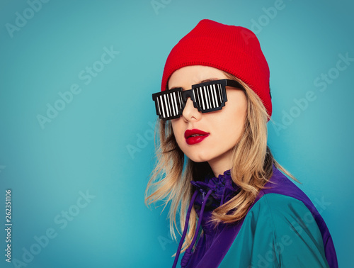 woman in red hat, sunglasses and suit of 90s © Masson