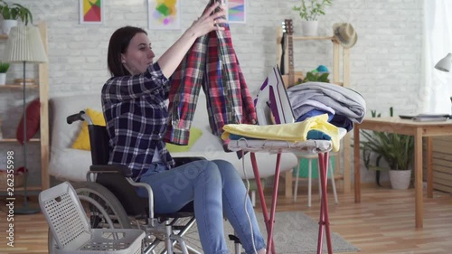 young disabled woman housewife washing clothes ,housework © petrushin1984