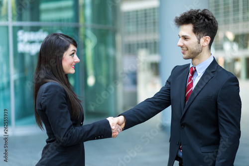 Handshake between business people outdoor © Minerva Studio