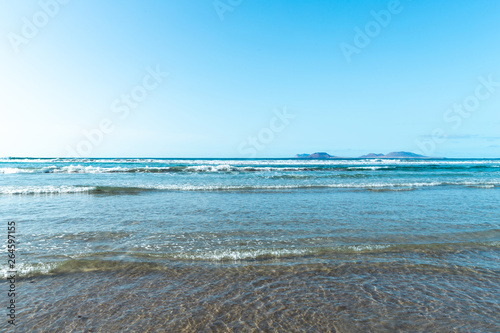 Beach view at Caleta de Famara, Lanzarote. © gitusik