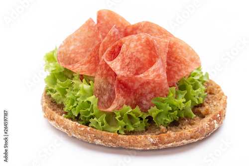 Sandwich with ham sausage on white background. © gitusik