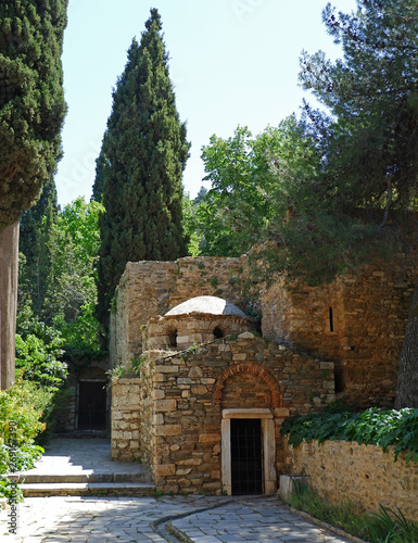Athens Greece, Kaisariani monastery small chapel and cypress tree